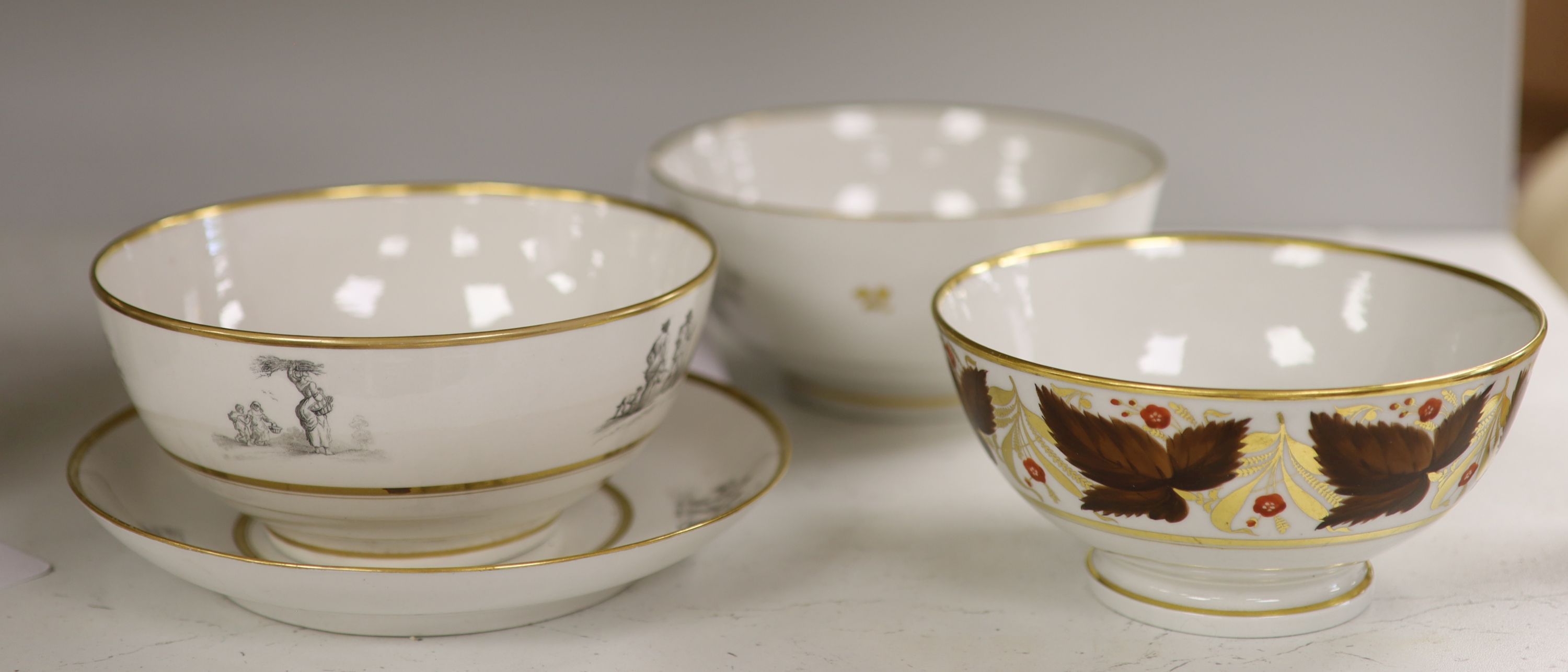 A Barr Flight and Barr bowl painted with brown leaves and red flowers, bowl and matching saucer, height overall 9cm, and a BFB bowl pri